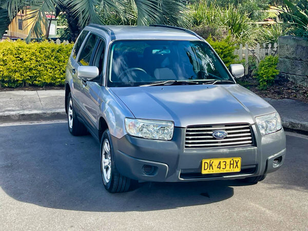 Subaru Forester for sale - metallic automatic silver 2007 model - Photo showing the front drivers side angle view 