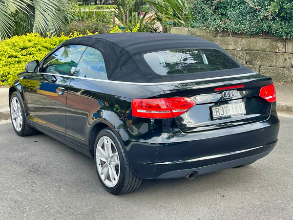 Audi A3 for sale – Soft Top Convertible 2009 Model in Black – Photo showing the view of the back passenger side angle view of the A3 with the roof up