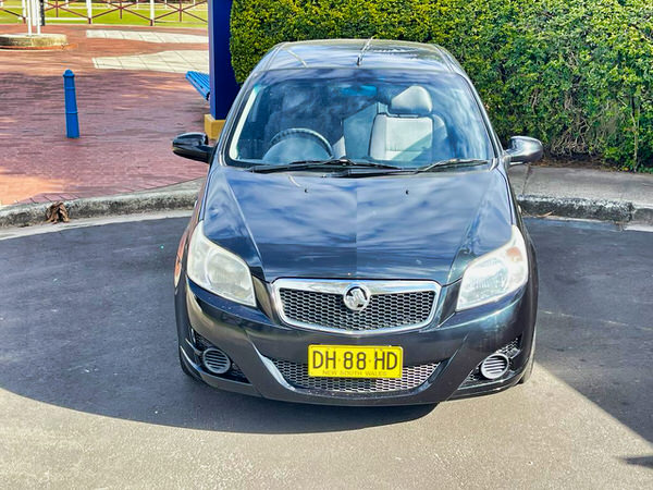 Used Holden Barina for sale in Sydney - Black 2009 Manual model - photo showing the front straight on view