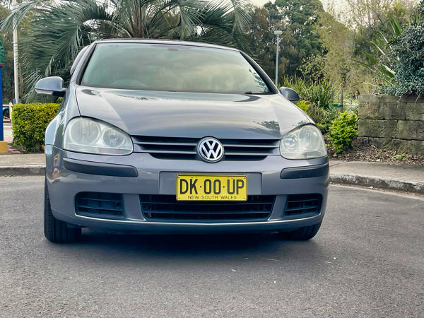 Used Golf for sale in Sydney - Automatic 2.0L Turbo Diesel Model in Metallic Gray - Photo showing the front straight on view with colour matching bumpers and front grille