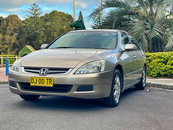 Used Honda Accord for sale - Automatic 3.0 Litre V6 VTEC Engine 2004 Model - Great Online Reviews - Photo showing the front drivers side angle view showing the colour matching front bumper and grille