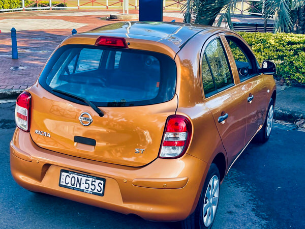 Nissan Micra for sale in Sydney - 2013 Automatic low kms Model - photo showing the rear driver side angle view