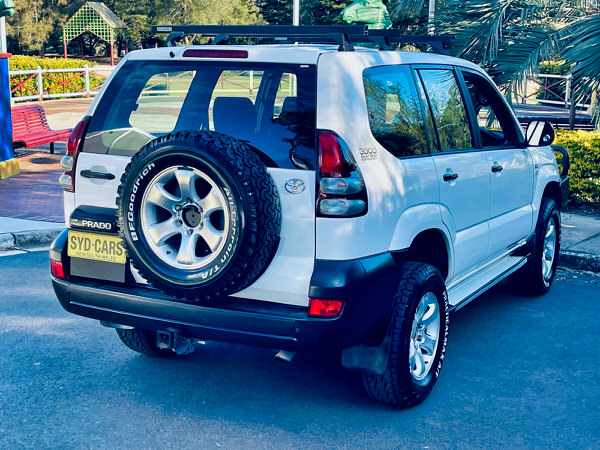 Used Toyota Prado for Sale - Manual 2008 Turbo Diesel Model with heavy duty Roo bars and roof rack - photo showing the view from the rear driver side angle view