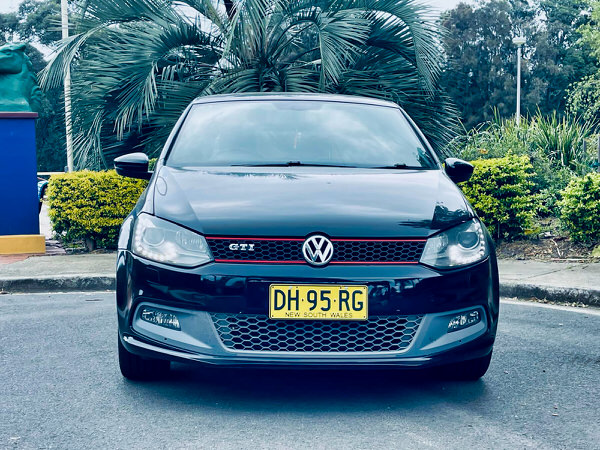 Used Polo for sale in Sydney - Polo GTI Automatic Model in black with Rego - photo showing the straight on view with colour matching front bumper and grille in black with silver VW logo